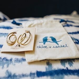 Hammered gold swirl earrings with post backing